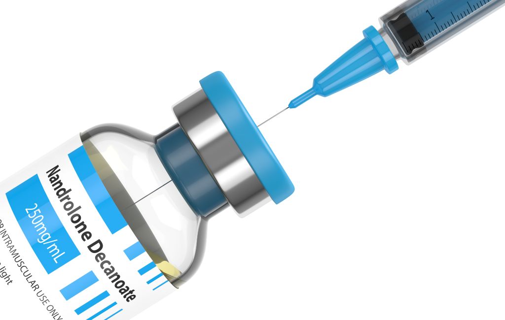 Nandrolone vial and syringe.