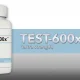 Bottle of Test-600x on background with banner.