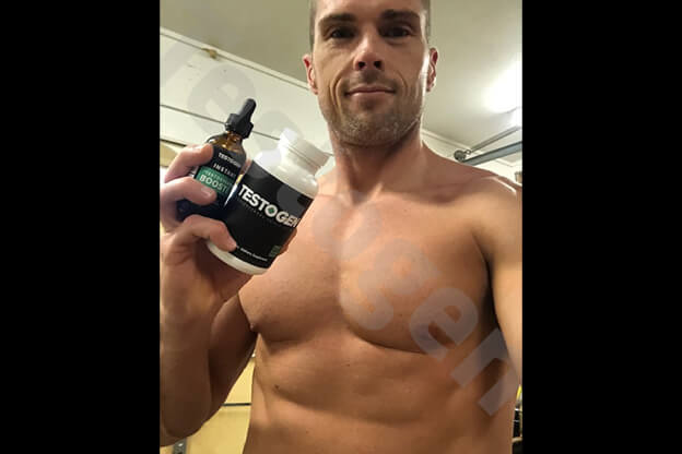 Shirtless Testogen customer showing his results.